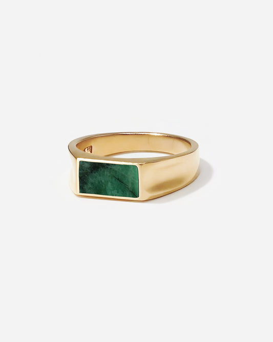 BØME Vale Stone Ring—custom-cut emerald men’s ring with distinctive concave sides, inspired by a tranquil valley for a serene, unpretentious style