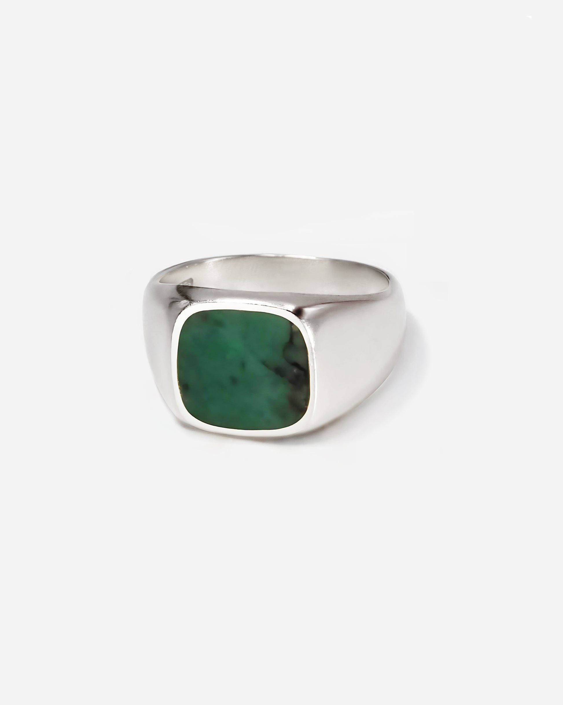 Men’s emerald signet ring with a custom-cut stone and sleek band, perfect as a pinky ring or statement accessory for effortless everyday or upscale occasions