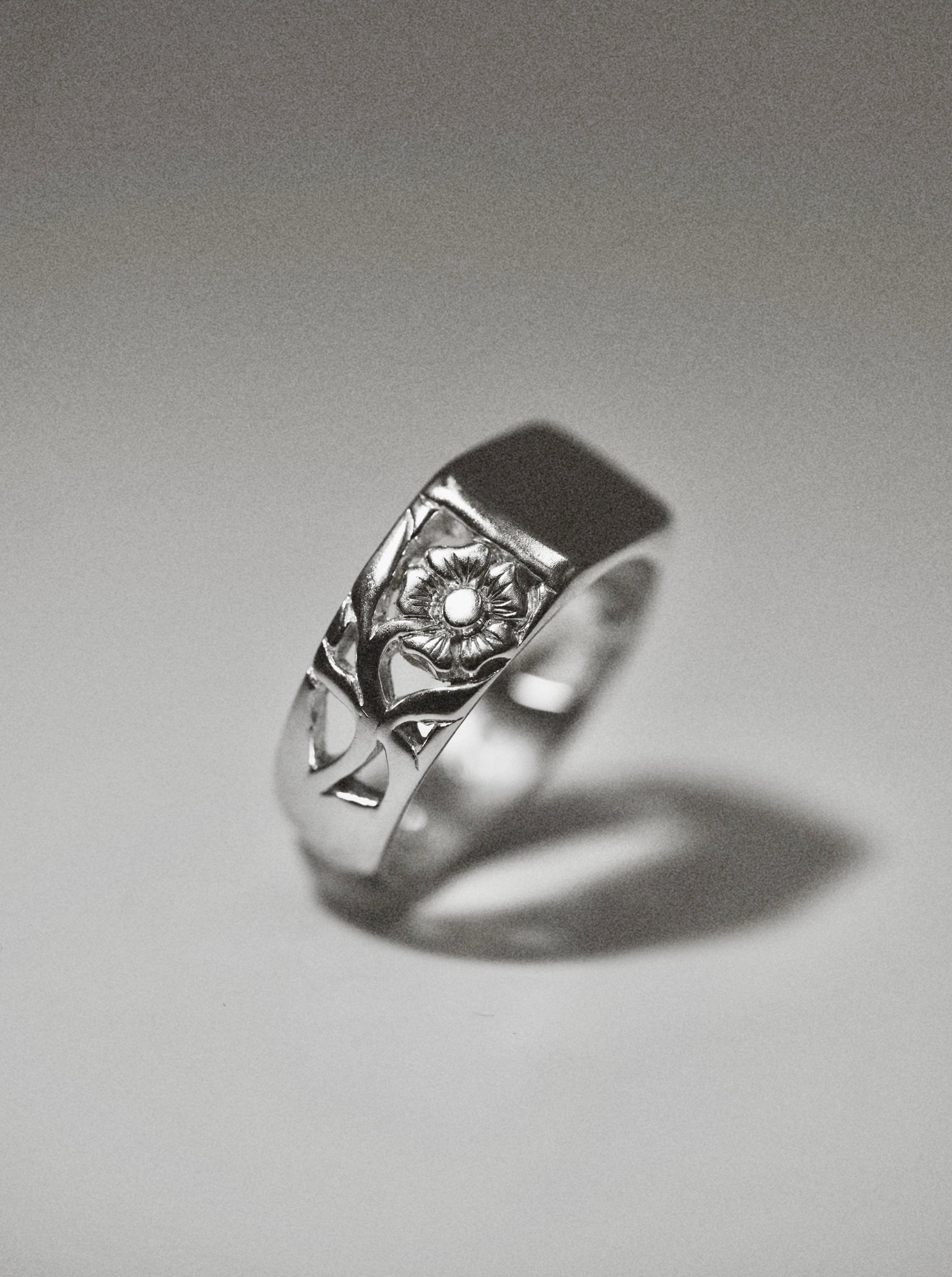 BØME Floreo Ring—a unique men’s statement ring with intricate flower cutouts, hand-carved from wax, and finished with a signature floral design
